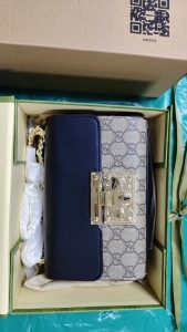 Woman's Handbag with bag charm 7.9*5.1*3.1" photo review