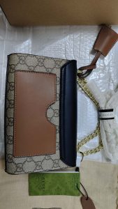 Woman's Handbag with bag charm 7.9*5.1*3.1" photo review