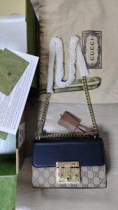 Woman's Handbag with bag charm 7.9*5.1*3.1" photo review
