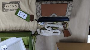 Woman's Handbag with bag charm 7.9*5.1*3.1" photo review